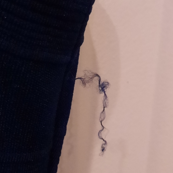 Navy blue dress, there's a pull in the material that can be tucked into fabric. - Picture 5 of 5